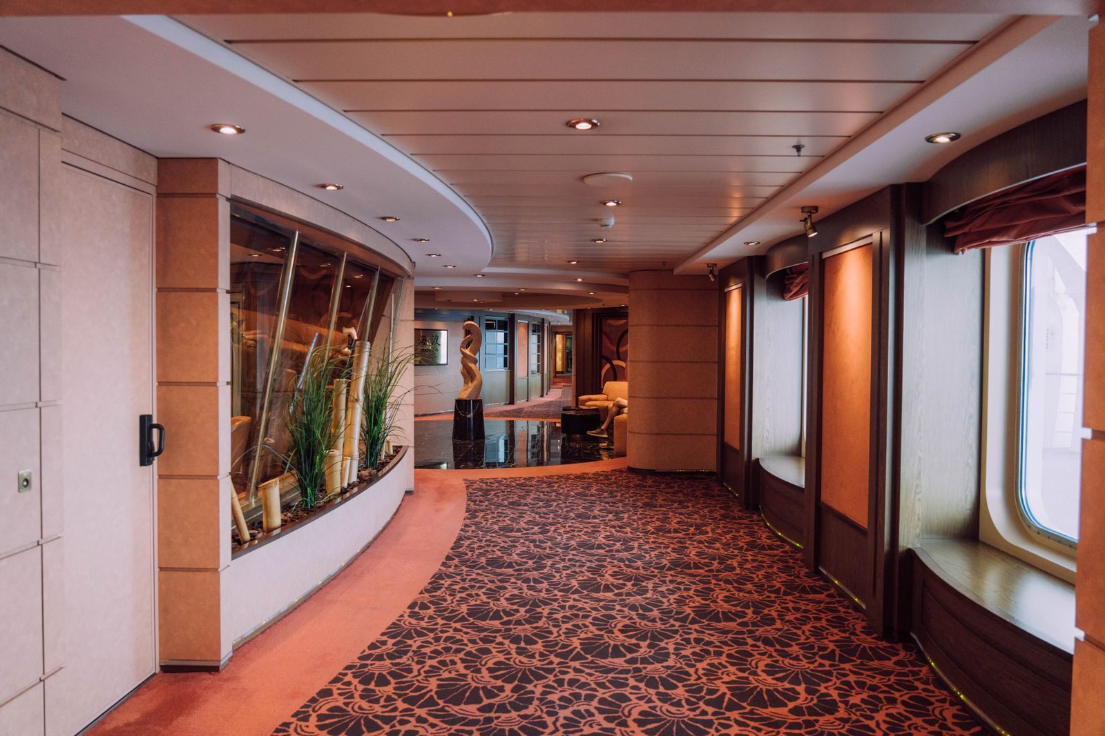 Carpeted interior corridor of a cruise ship, the kind of space agents walk on a ship inspection