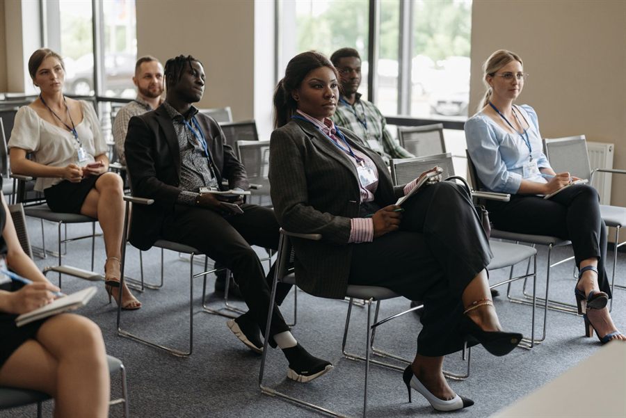 Professionals listening at a seminar